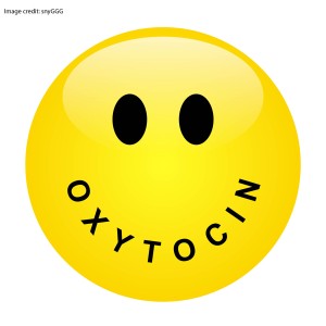 A smiley face with the word "oxytocin" as the smile