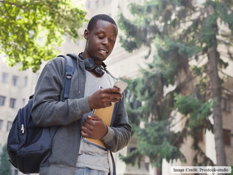 Black College Student Holding Phone