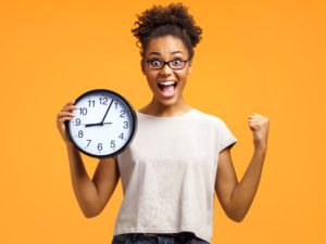 Student Holding Clock