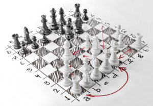 A chess board seen from an angle, with red arrows showing how pieces might move in different combinations