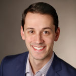 Headshot of Dr. Morgan Polikoff, smiling at the camera