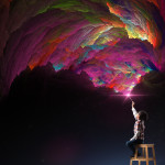 Child sitting on a stool creates fantastic color patterns in the air