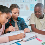 3 students working together on a math problem