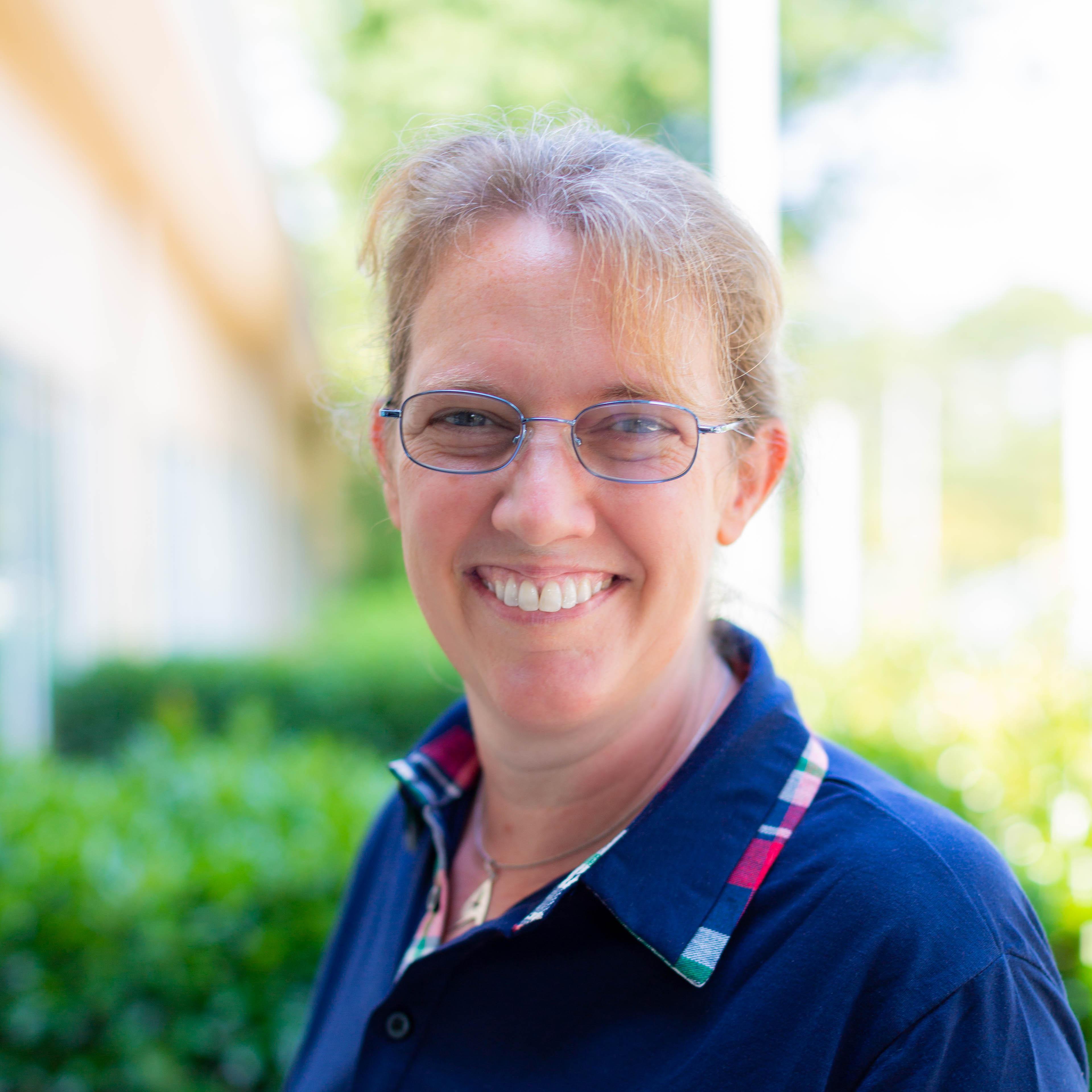 Headshot of author and teacher Beth Hawks