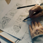 Young woman draws an animated storyboard
